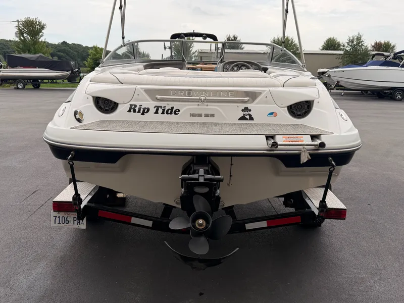 Slide: The Image of The image shows a 2009 Crownline 185 SS boat on a trailer. - 8