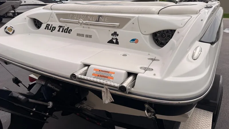 Slide: The Image of Rear view of a 2009 Crownline 185 SS boat with swim platform and speakers. - 12