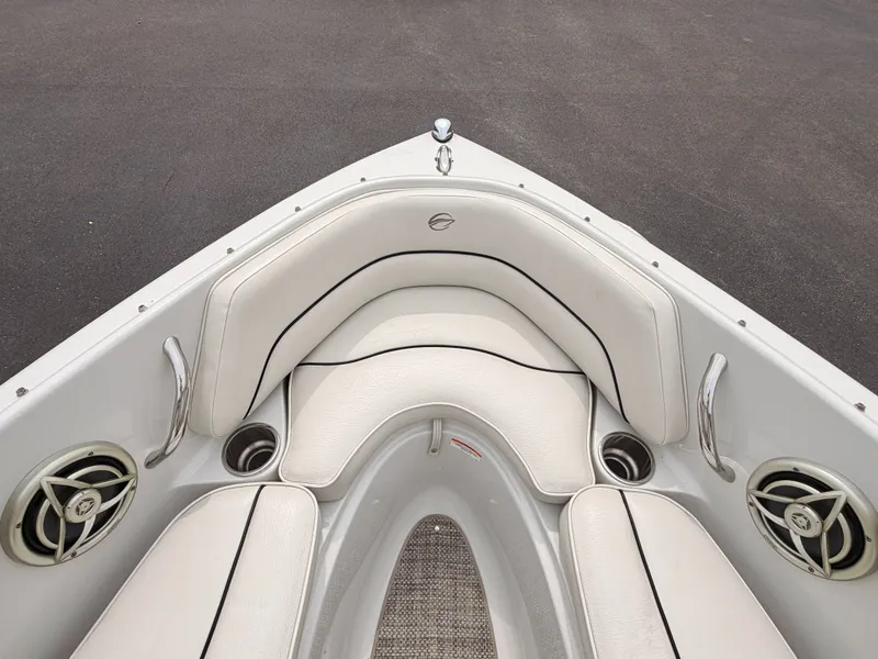 Slide: The Image of The 2009 Crownline 185 SS features elegant white upholstery in the bow area with speakers. - 45