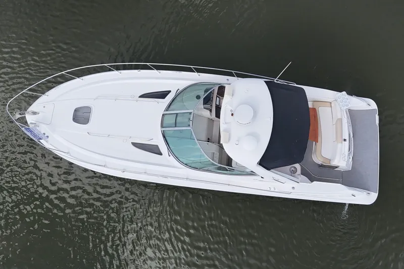 Slide: The Image of Aerial view of 2008 Sea Ray Sundancer 330 yacht on water. - 4