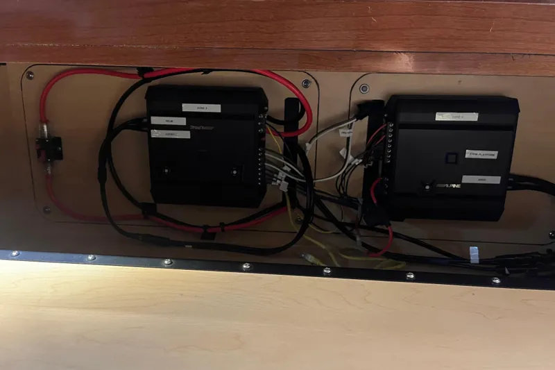 Slide: The Image of Electrical components inside a 2008 Sea Ray 350 Sundancer boat. - 50