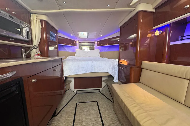 Slide: The Image of Luxurious interior of 2008 Sea Ray 350 Sundancer yacht with cozy seating and modern amenities. - 28