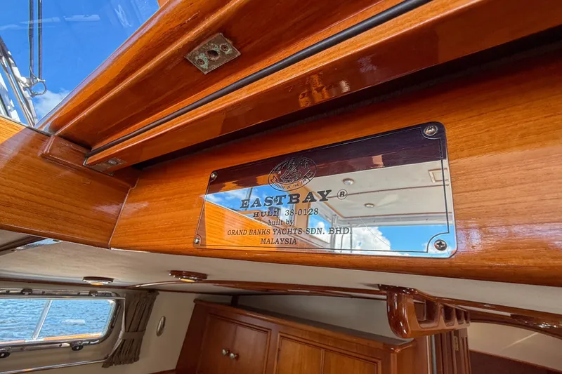 Slide: The Image of Plaque inside 2003 Grand Banks 38 Eastbay HX yacht, showcasing craftsmanship and design. - 34