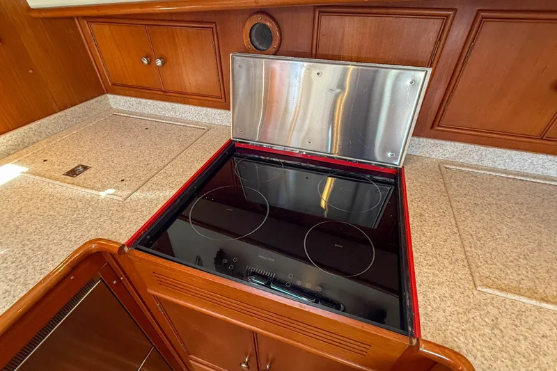 Slide: The Image of Modern kitchen with induction cooktop on 2003 Grand Banks 38 Eastbay HX yacht. - 21