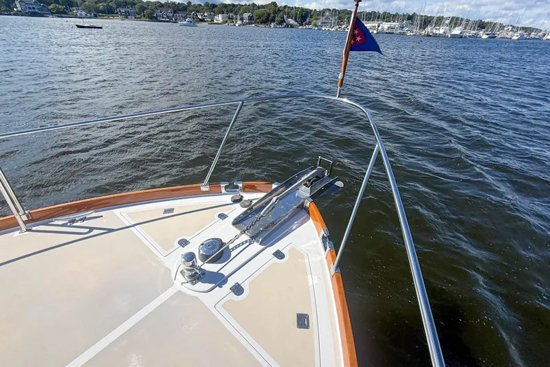 Slide: The Image of Bow view of 2003 Grand Banks 38 Eastbay HX on calm waters. - 40