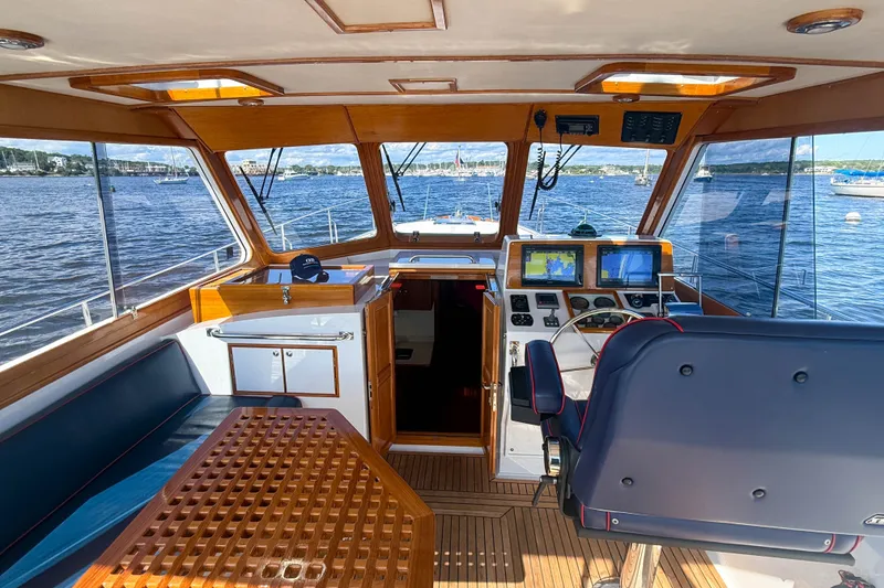 Slide: The Image of Interior view of 2003 Grand Banks 38 Eastbay HX yacht with navigation equipment. - 6