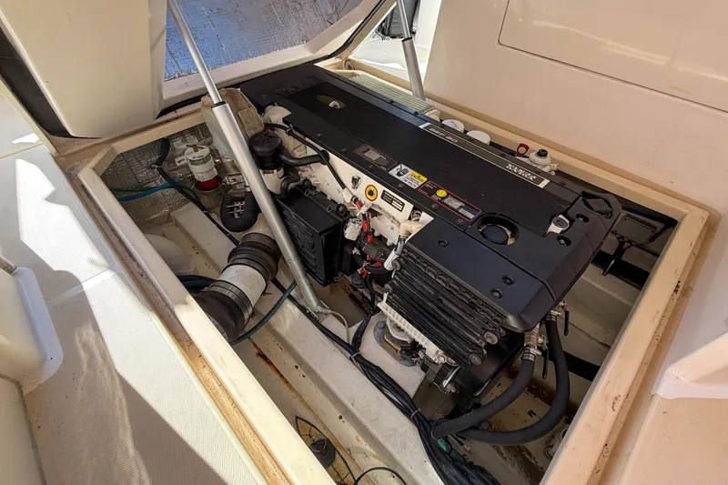 Slide: The Image of Engine compartment of a 2008 True North 34 boat, showcasing detailed mechanical components. - 35