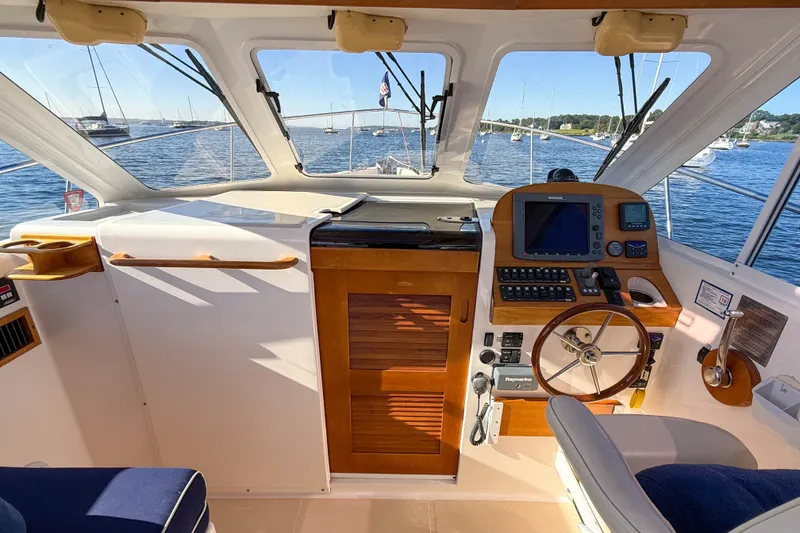 Slide: The Image of Interior view of 2008 True North 34 boat cockpit with navigation equipment. - 25