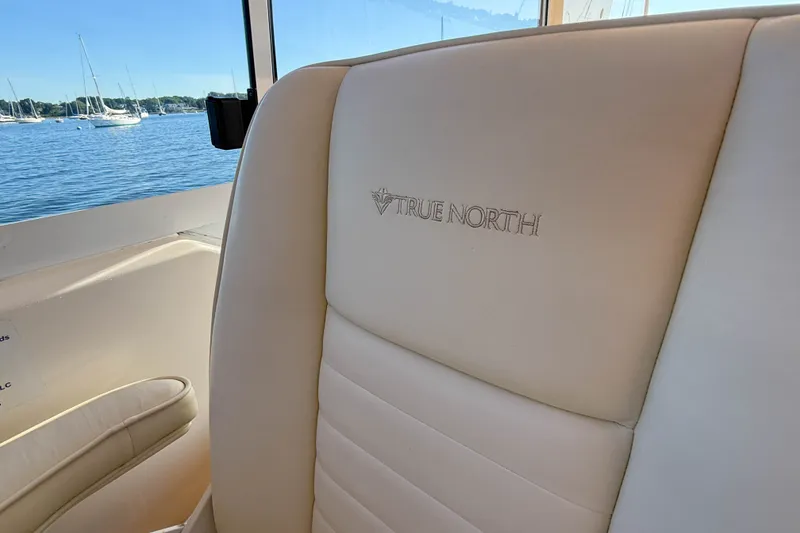 Slide: The Image of Luxurious True North 34 boat seat, 2008 model, with scenic water view. - 40
