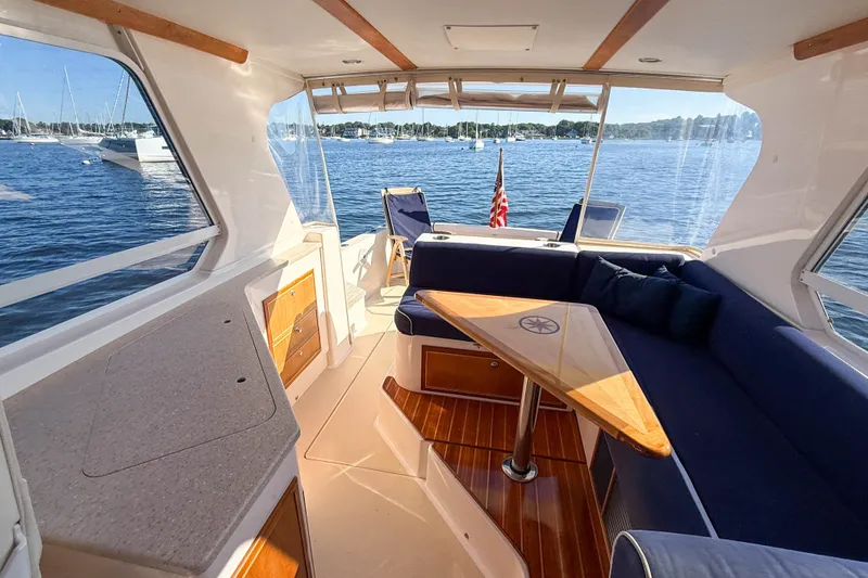 Slide: The Image of Interior of 2008 True North 34 yacht with elegant seating and scenic water view. - 33