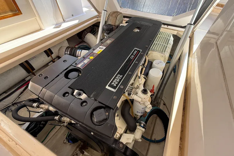 Slide: The Image of Engine compartment of a 2008 True North 34 boat, featuring a Volvo Penta engine. - 34