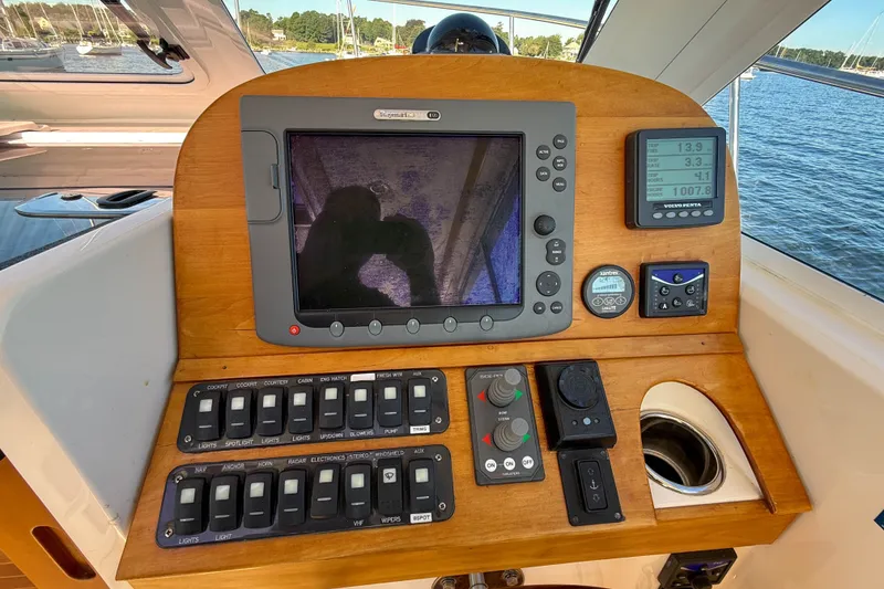 Slide: The Image of Control panel of a 2008 True North 34 boat with navigation instruments. - 13