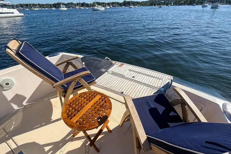 Slide: The Image of Deck of 2008 True North 34 yacht with chairs and table overlooking water. - 37