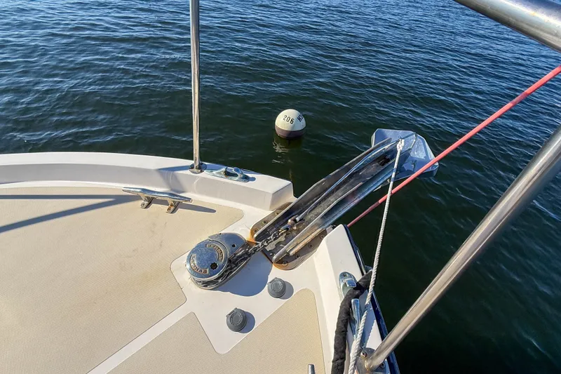 Slide: The Image of Bow of 2008 True North 34 boat with anchor and mooring buoy on water. - 19