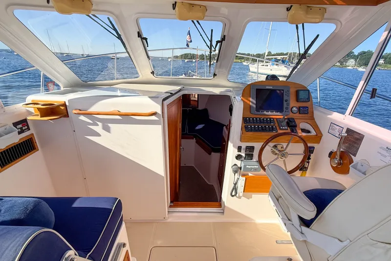 Slide: The Image of Interior view of 2008 True North 34 boat cockpit with navigation equipment. - 26