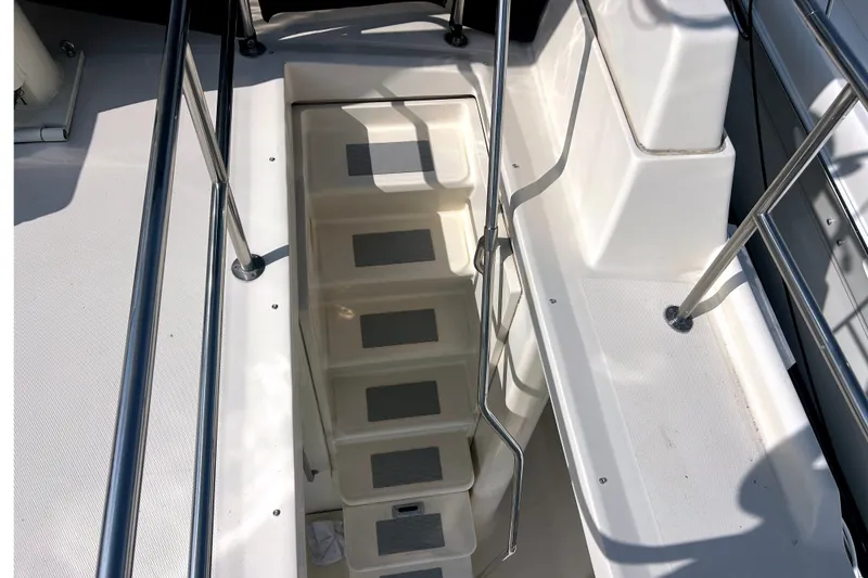 Slide: The Image of Staircase on 2008 Mainship 34 Trawler with stainless steel railings. - 39