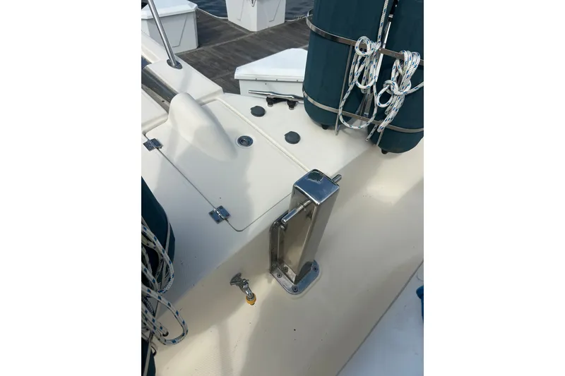 Slide: The Image of 2008 Mainship 34 Trawler deck with ropes and stainless steel fittings. - 28