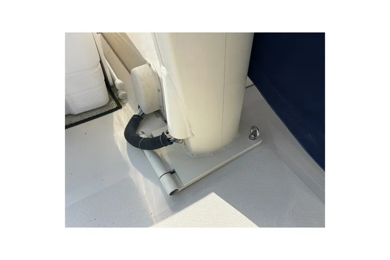 Slide: The Image of Close-up of a 2008 Mainship 34 Trawler deck detail with cables and fittings. - 41