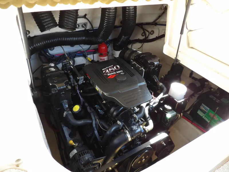 Slide: The Image of Engine compartment of 2005 Sea Ray 240 Sundeck with MerCruiser 350 MAG MPI. - 34