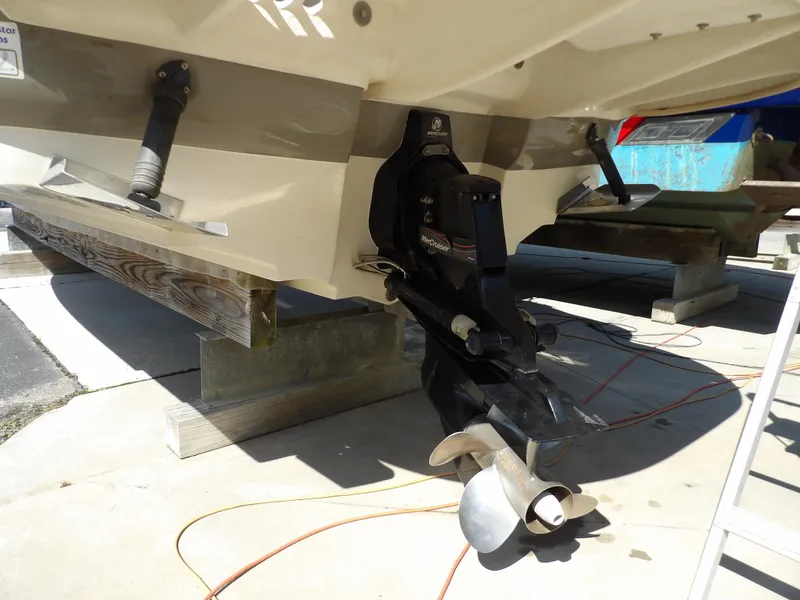 Slide: The Image of 2005 Sea Ray 240 Sundeck boat stern and propeller on dry dock. - 36
