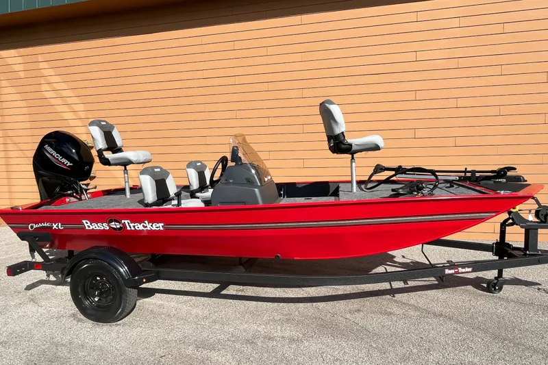 The Image of 2027 Tracker Bass Tracker Classic XL boat in vibrant red on a trailer. - 0