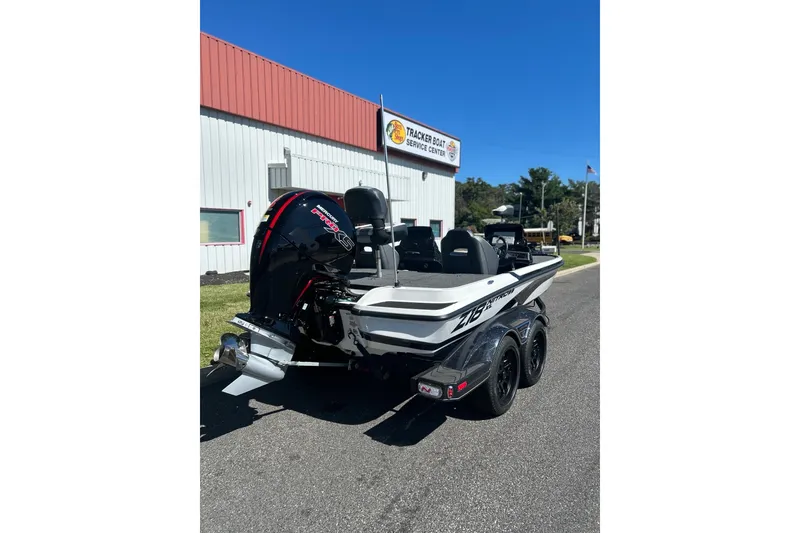 Slide: The Image of 2027 Nitro Z18 XL Pro boat with powerful outboard motor at service center. - 4