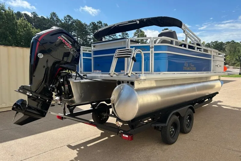 Slide: The Image of 2027 Sun Tracker Fishin' Barge 20 DLX pontoon boat with Mercury engine on trailer. - 15