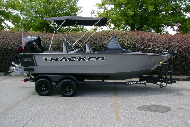 The Image of 2027 Tracker Targa V-18 Combo boat on trailer, parked outdoors. - 0