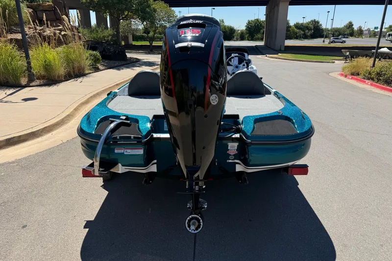 Slide: The Image of 2027 Nitro Z17 boat with Mercury engine, parked outdoors on a sunny day. - 10