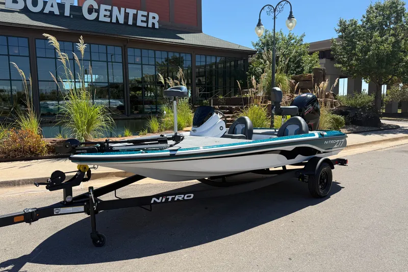 Slide: The Image of 2027 Nitro Z17 boat on trailer outside boat center. - 1