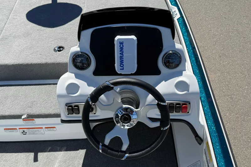 Slide: The Image of Steering console of 2027 Nitro Z17 boat with Lowrance display and gauges. - 11