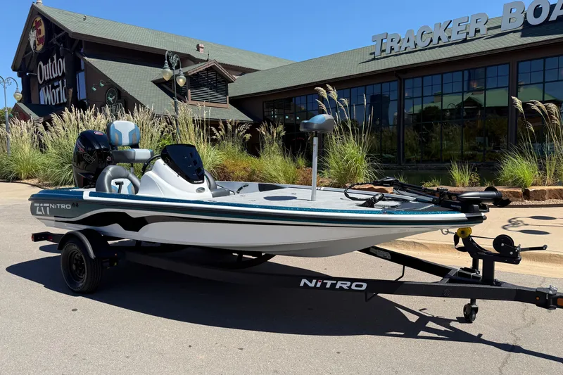 Slide: The Image of 2027 Nitro Z17 boat on trailer outside Tracker Boats store. - 8