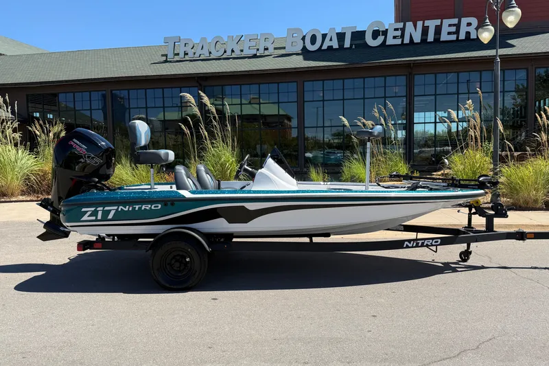 Slide: The Image of 2027 Nitro Z17 boat at Tracker Boat Center, parked outdoors. - 7
