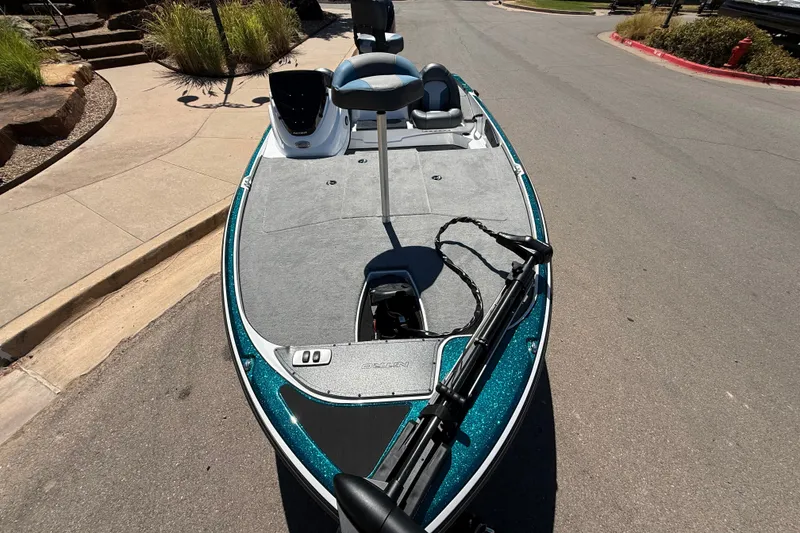 Slide: The Image of Nitro Z17 2027 fishing boat parked on a street, featuring a sleek design and modern equipment. - 4