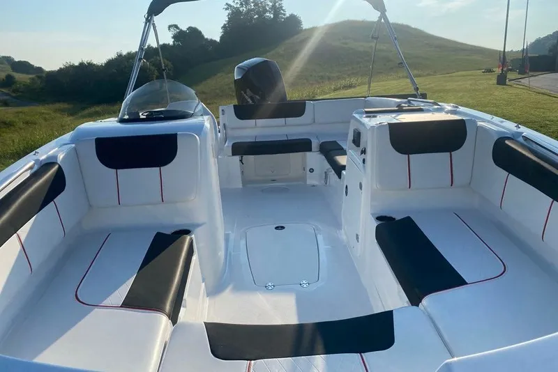 Slide: The Image of 2027 Tahoe 2150 boat interior with spacious seating and modern design. - 6
