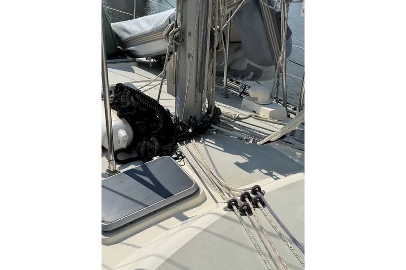 Slide: The Image of Deck of 1984 Tayana Aft Cockpit sailboat with ropes and rigging. - 5