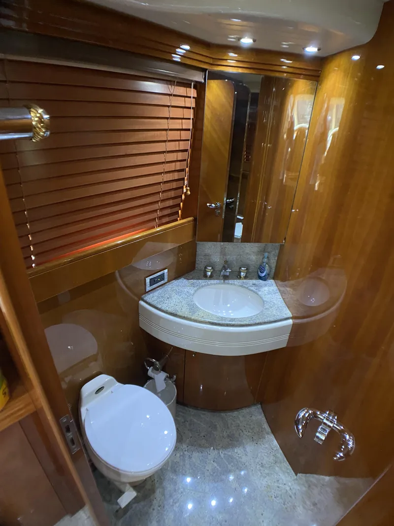Slide: The Image of Luxurious bathroom in 1999 Azimut 85 Ultimate yacht with wooden finishes and modern fixtures. - 23