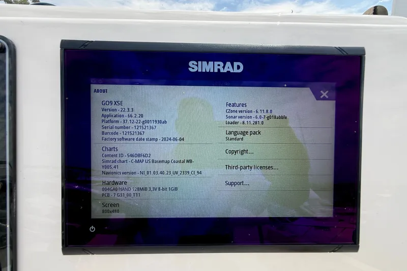 Slide: The Image of Simrad display showing system information on a Grady-White Fisherman 180, 2026 model. - 19