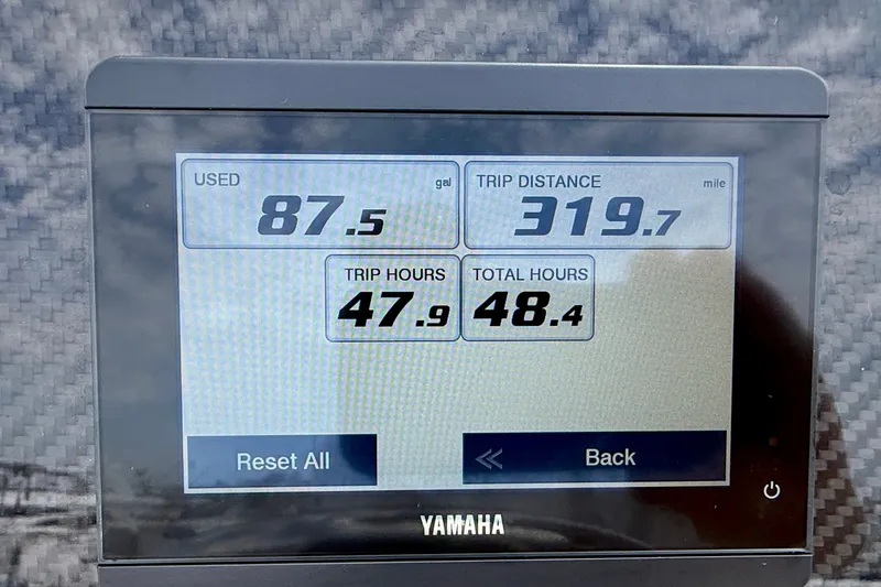 Slide: The Image of Yamaha display showing fuel usage, trip distance, and hours for Grady-White Fisherman 180, 2026. - 26
