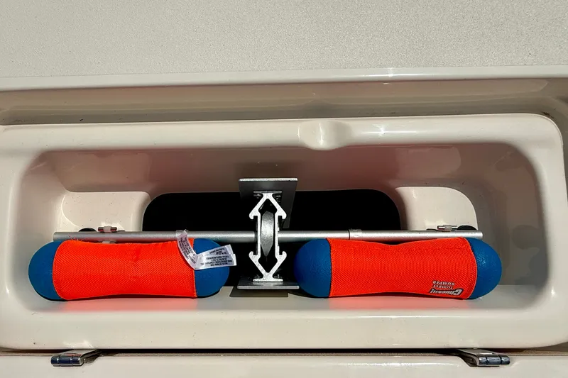 Slide: The Image of Storage compartment on 2026 Grady-White Fisherman 180 boat with safety equipment. - 5