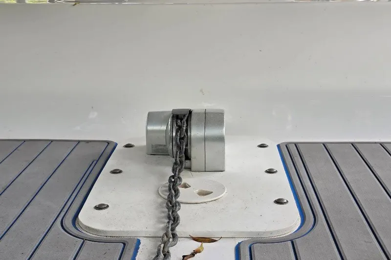 Slide: The Image of Anchor chain mechanism on 2006 Twin Vee 26 Express boat deck. - 53