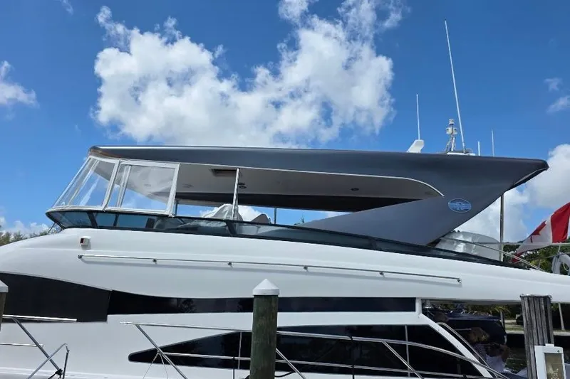 Slide: The Image of 2008 Neptunus Flybridge MY yacht docked under a clear blue sky. - 6