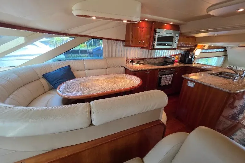 Slide: The Image of Luxurious interior of 2008 Neptunus Flybridge MY yacht with elegant seating and modern kitchen. - 64