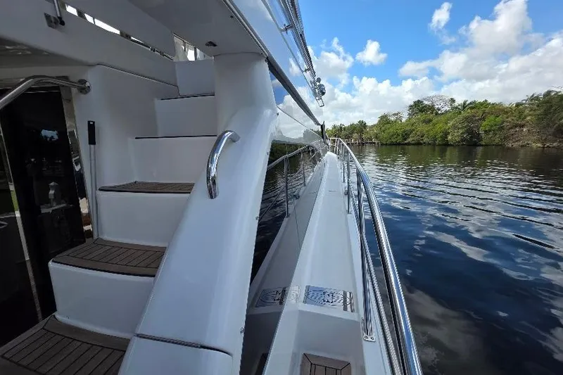 Slide: The Image of 2008 Neptunus Flybridge MY yacht with sleek design on a serene waterway. - 17