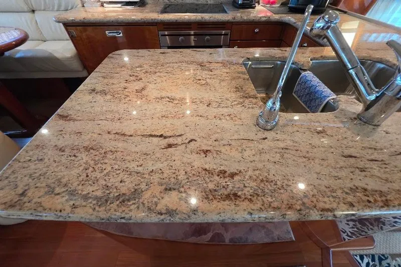 Slide: The Image of Luxurious granite countertop with sink in 2008 Neptunus Flybridge MY yacht kitchen. - 57
