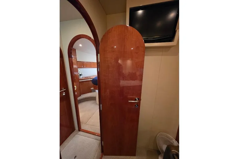 Slide: The Image of Interior of 2008 Neptunus Flybridge MY yacht with wooden doors and mounted TV. - 118