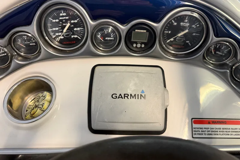 Slide: The Image of Dashboard of a 2005 Crownline 270 CR boat with Garmin navigation system. - 21