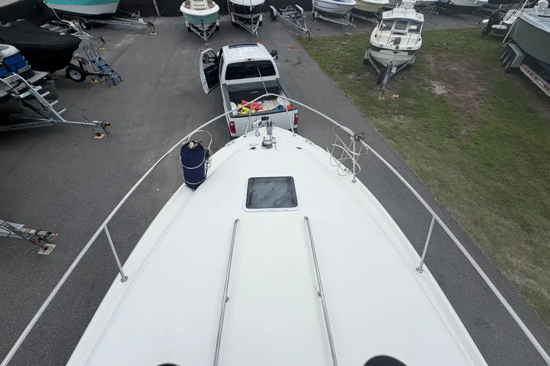 Slide: The Image of Overhead view of 2006 Sea Ray 300 Sundancer in a boatyard. - 18