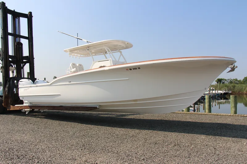 Slide: The Image of 2019 Buddy Davis 34 Center Console boat on forklift, ready for launch. - 14