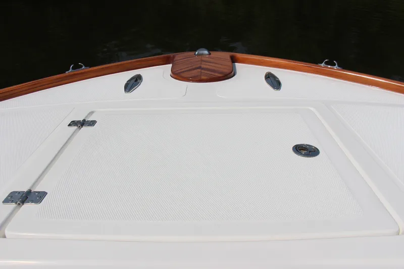 Slide: The Image of Bow deck of 2019 Buddy Davis 34 Center Console boat with wood accents. - 27